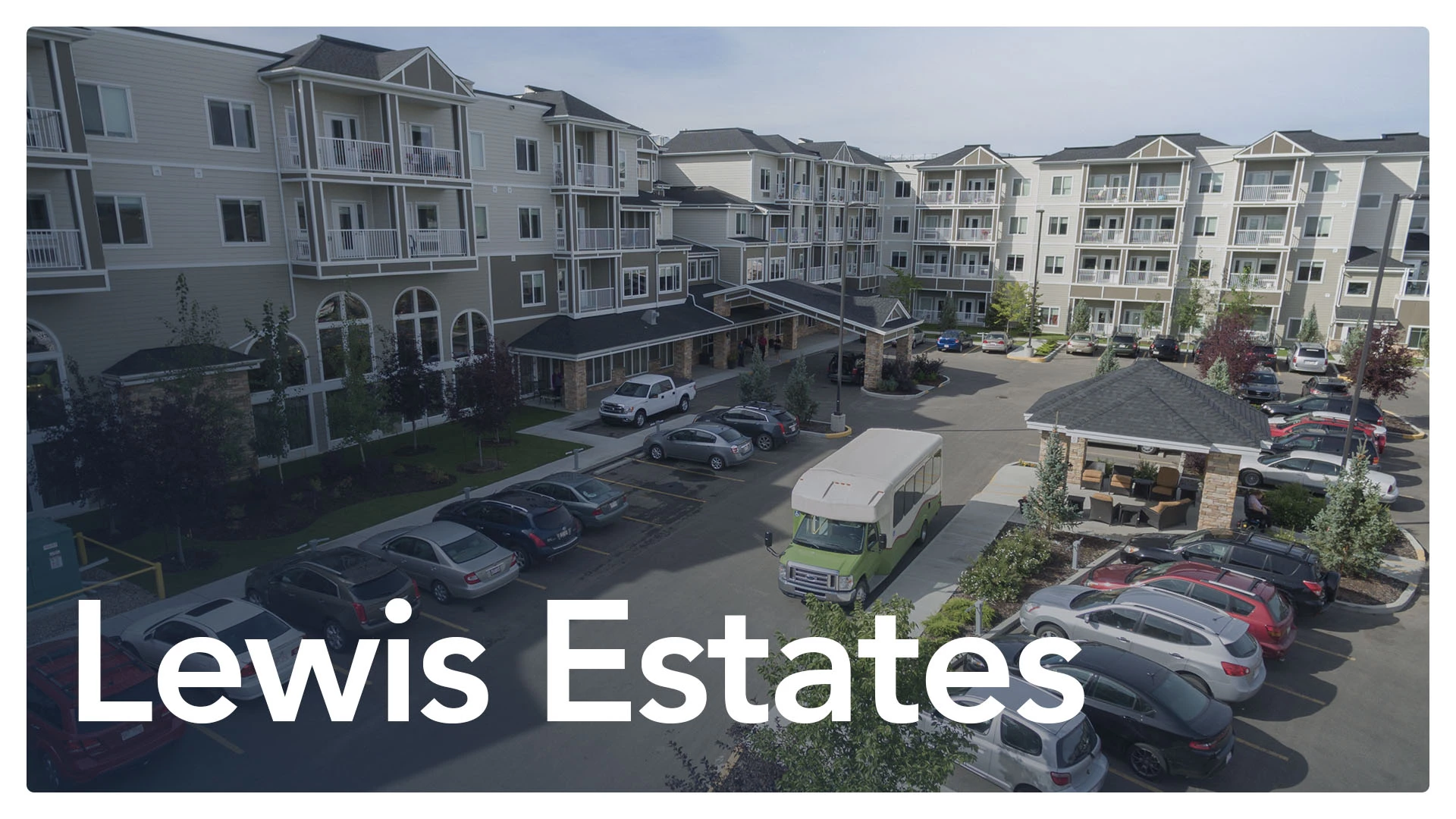 Lewis Estates exterior with text and gradient overlay