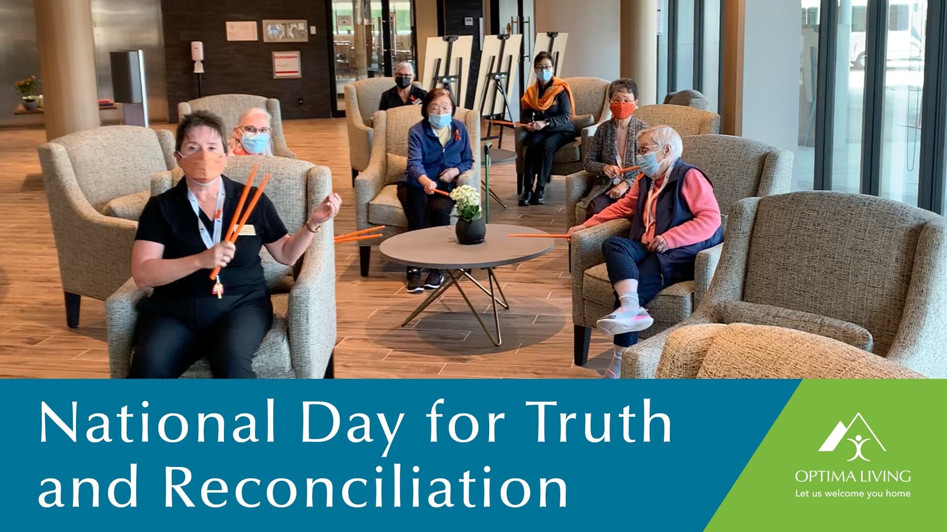 A group of elderly people celebrating National Truth Day