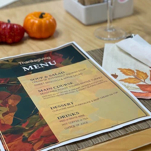 Thanksgiving menu featuring a starter, main course, dessert, and drinks.