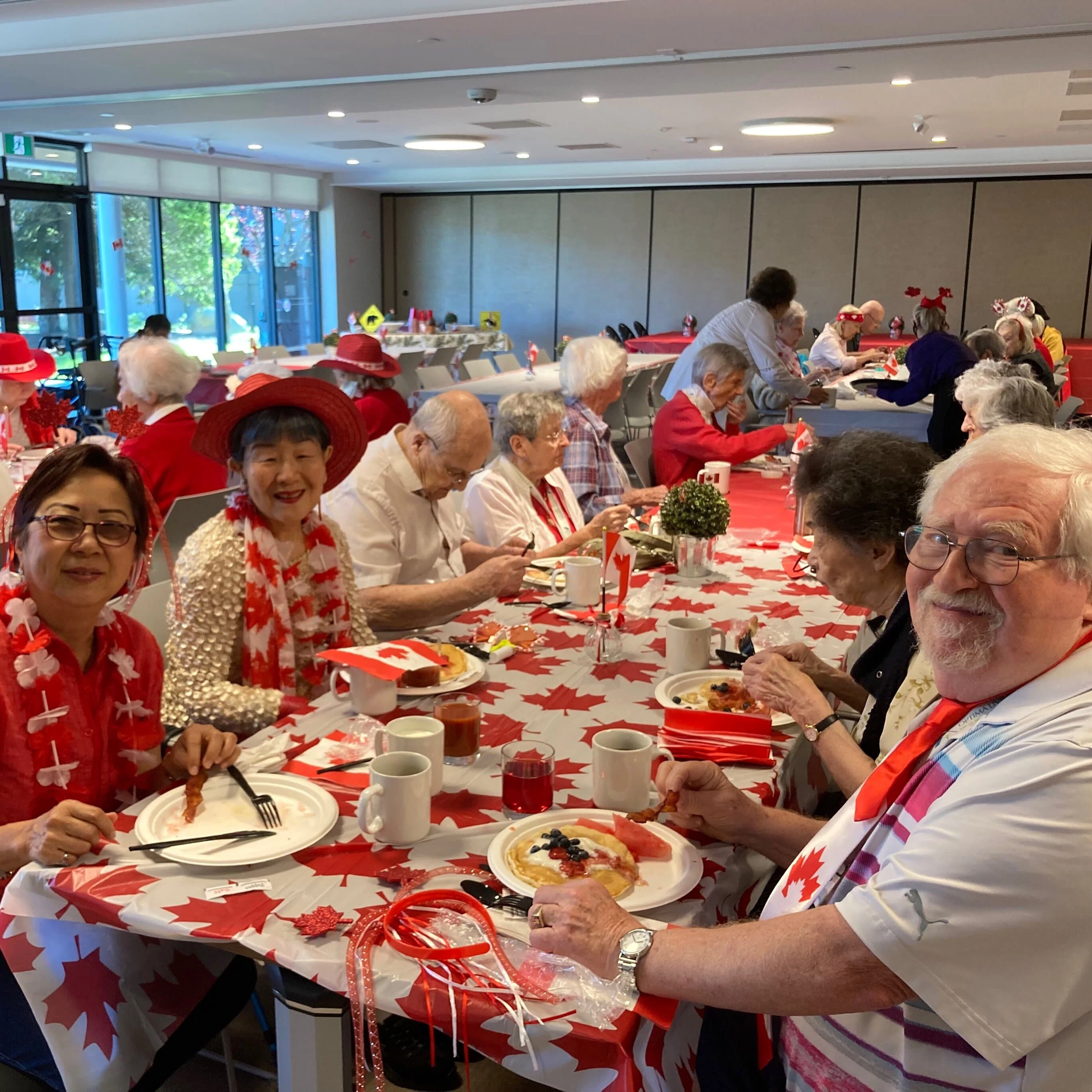 Some senior citizens having lunch on Canada Day