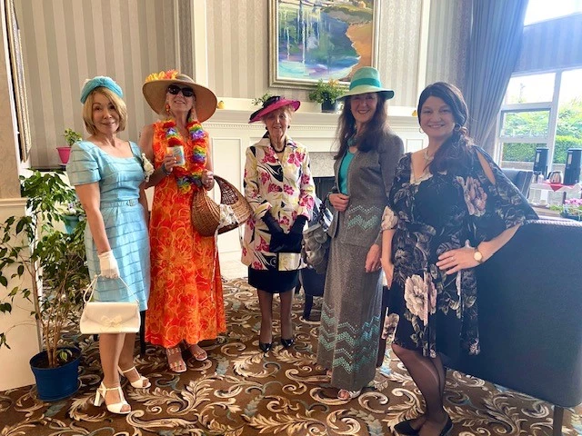Group of seniors posing in their vintage clothing