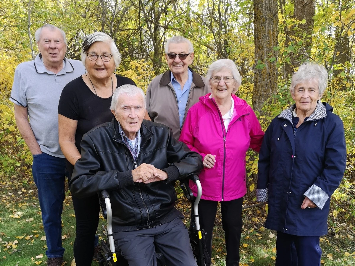 A group of seniors in a forest