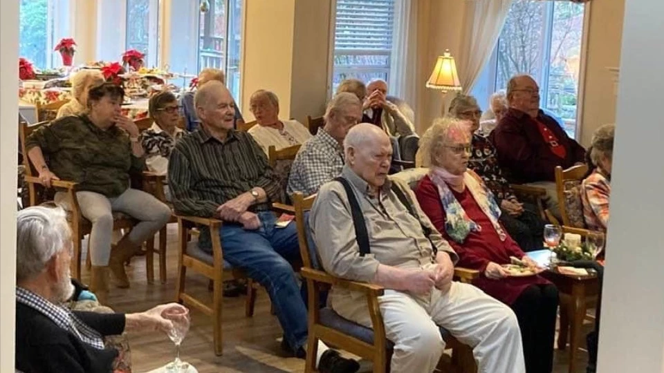 A gathering of senior citizens on Christmas