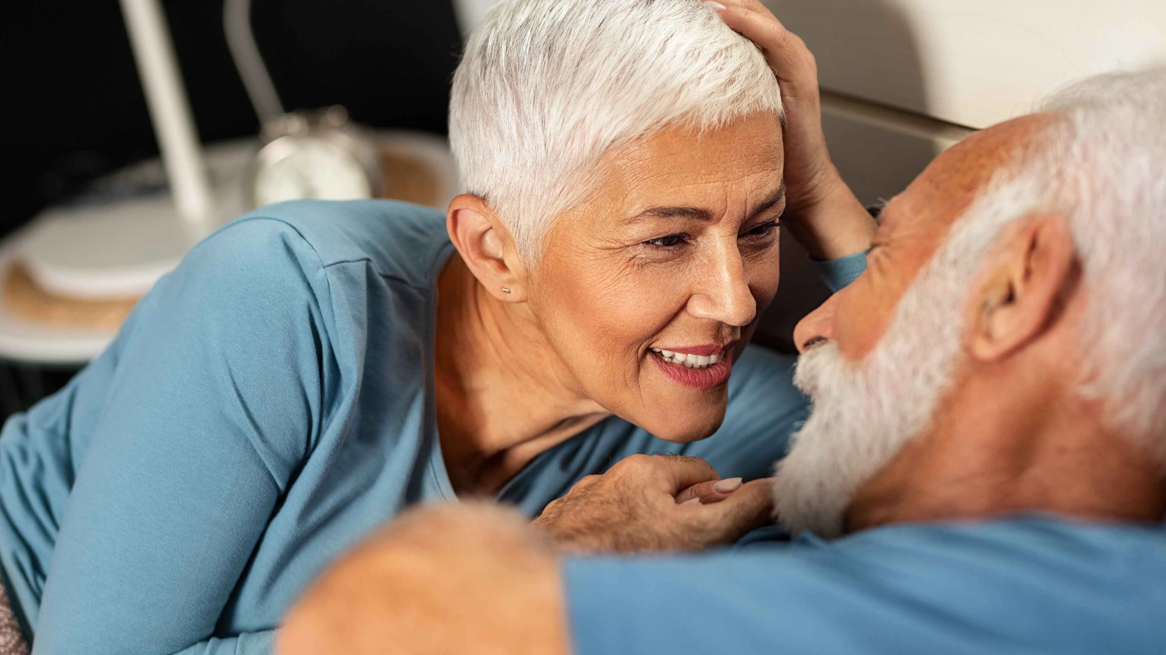 An elderly couple living happy and healthy life at optima living's retirement home