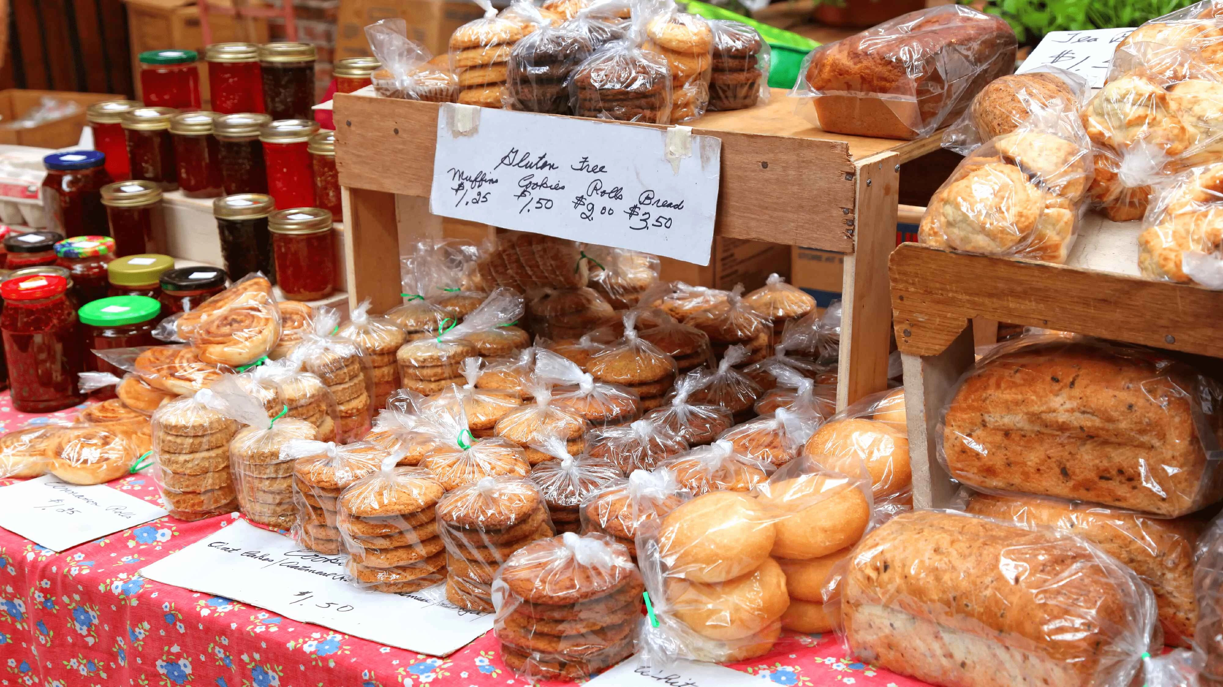 Farmers market at Aster Gardens offers freshly baked bread.